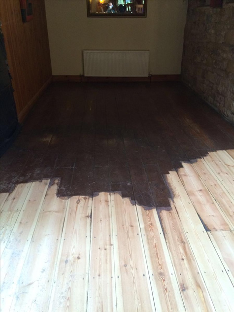 The wooden floor sanding has began