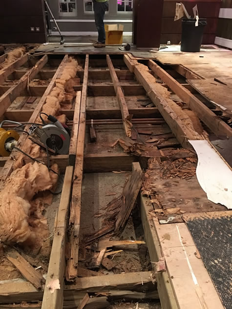 The worn-out wooden floor framework