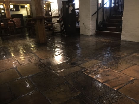 Stone floor being cleaned